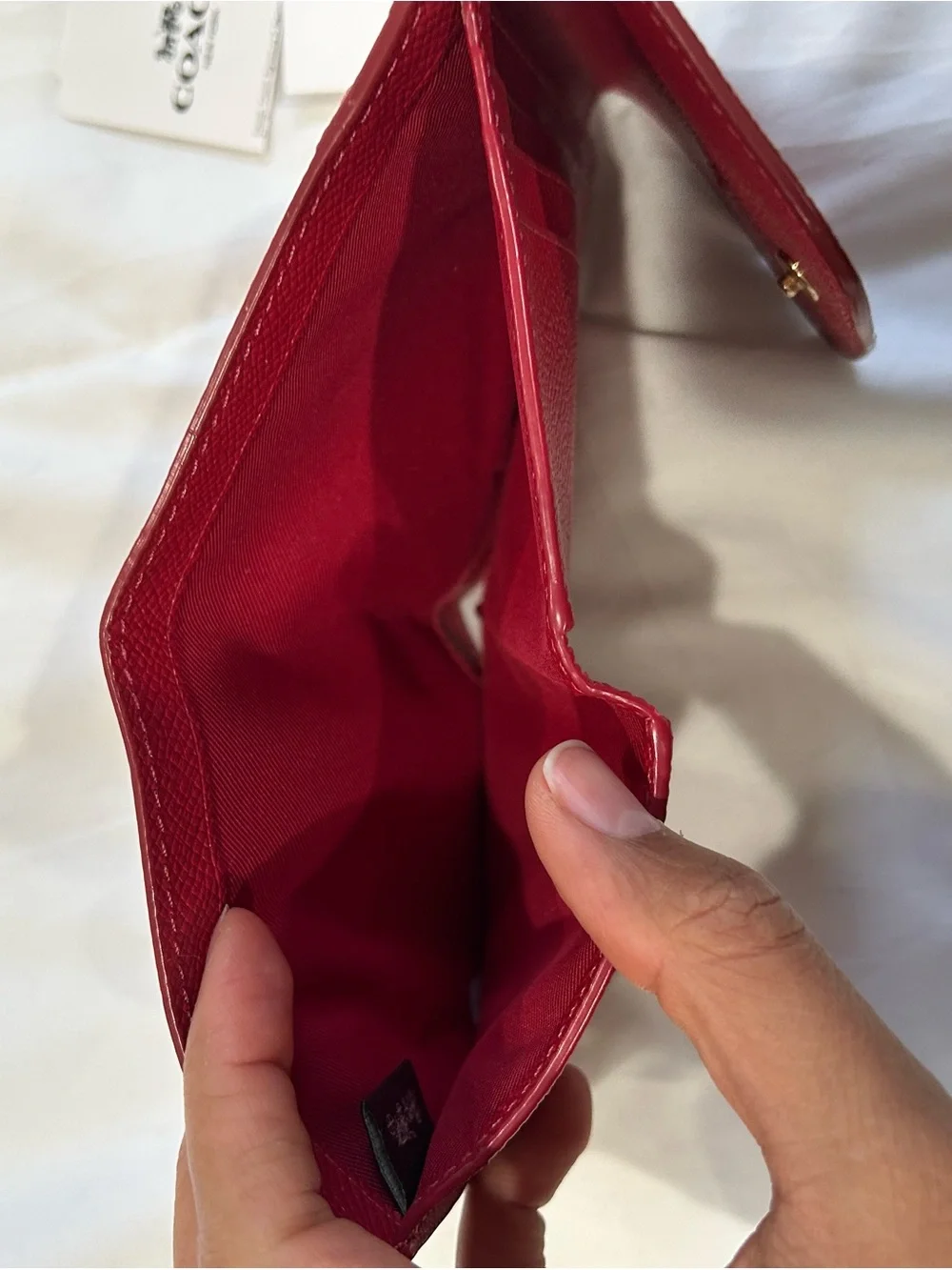 Coach Red Textured Leather Fold Wallet with Gold Logo